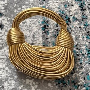 Gold Statement Knot Handle Bag